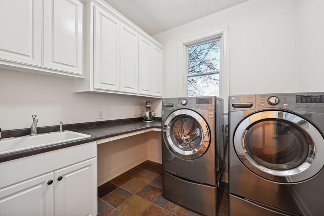 Main floor laundry room. | Image 69