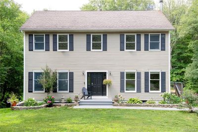 Colonial house with a front lawn | Image 2