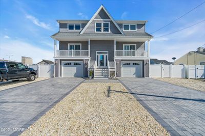 Paver driveway provides plenty of off street parking. | Image 2