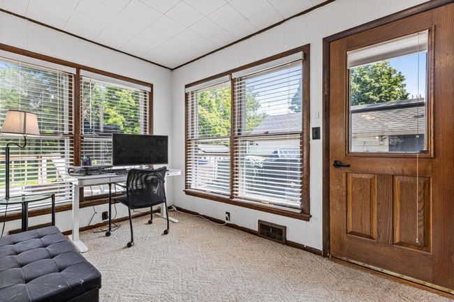 Natural light overlooking back yard | Image 13