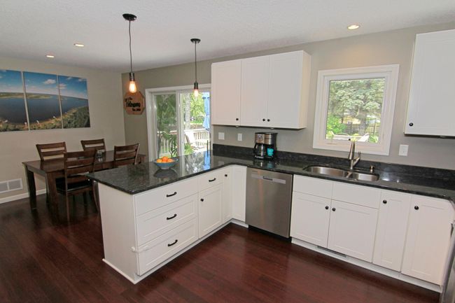 Another view of the kitchen. | Image 7