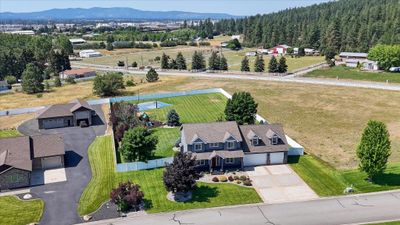 20302 E Happy Trails Ln, Home with 5 bedrooms, 4 bathrooms and null parking in Otis Orchards WA | Image 1