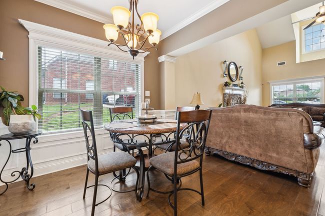 The open-concept layout makes entertaining a breeze, seamlessly connecting the kitchen to the living and dining areas! 1107 Sycamore Leaf Way Murfreesboro, TN 37129 | Image 13