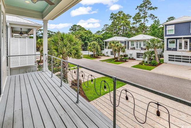 Wooden terrace featuring ceiling fan | Image 31