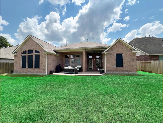 Pool-ready backyard! Large patio great for entertaining. Gas connections make it easy to grill outside. | Image 24
