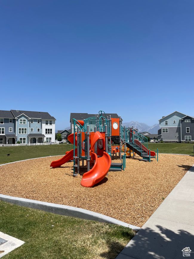 Community jungle gym featuring a yard | Image 41
