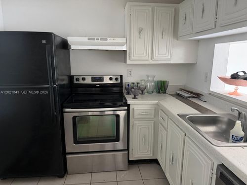 c-209-492 Nw 165th Street Rd, Miami, FL, 33169-6464 | Card Image
