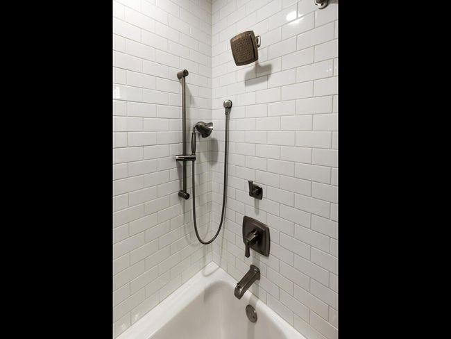 lower level bath with hand held fixtures | Image 51