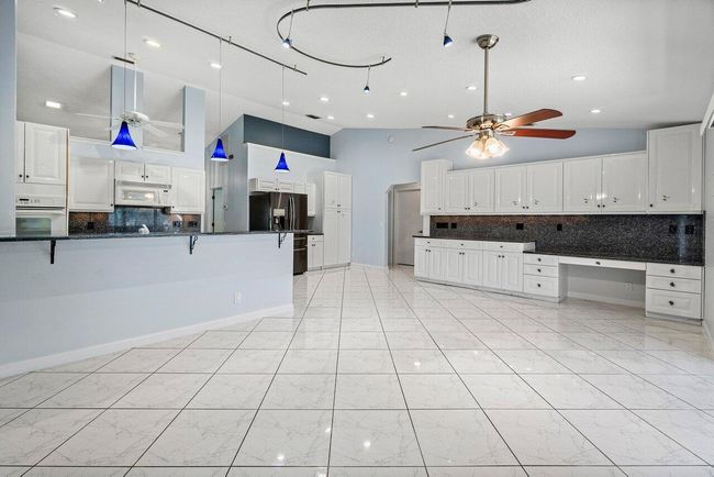 61 W Rubber Tree Dr, House other with 3 bedrooms, 2 bathrooms and null parking in Lake Worth FL | Image 9