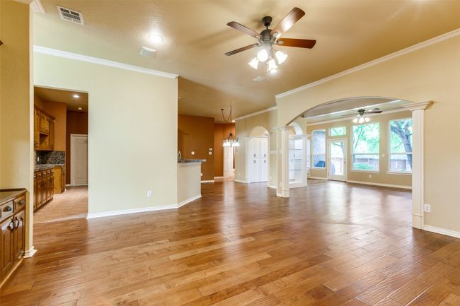 View of den looking into sun/craft room. | Image 12