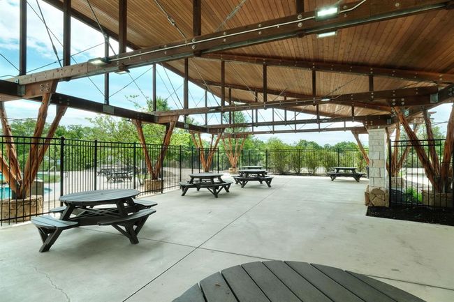View of home's community pool area featuring a pavilion | Image 33