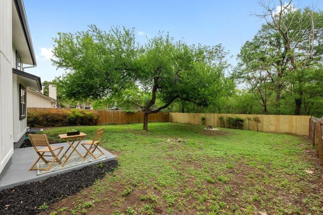 View of yard with a fenced backyard and a patio | Image 20