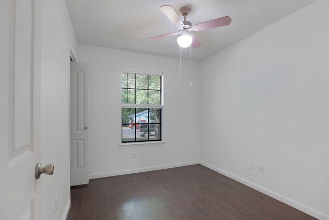 Third Bedroom with a ceiling fan | Image 24