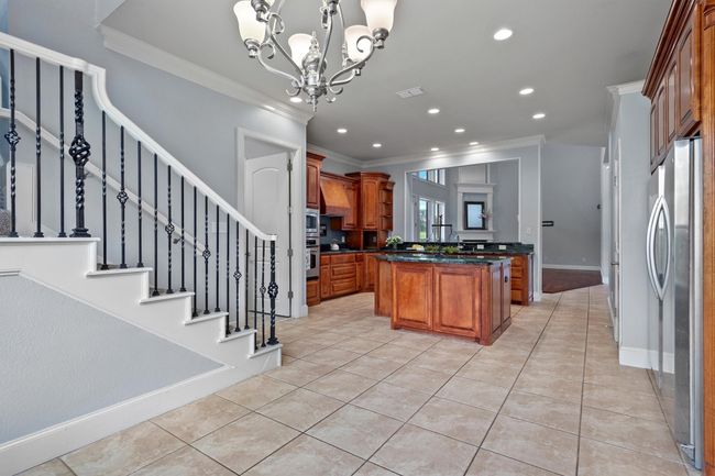 Direct access to the second staircase for added flow and convenience. | Image 11