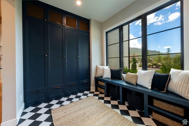 Mudroom featuring light flooring and a mountain view | Image 53