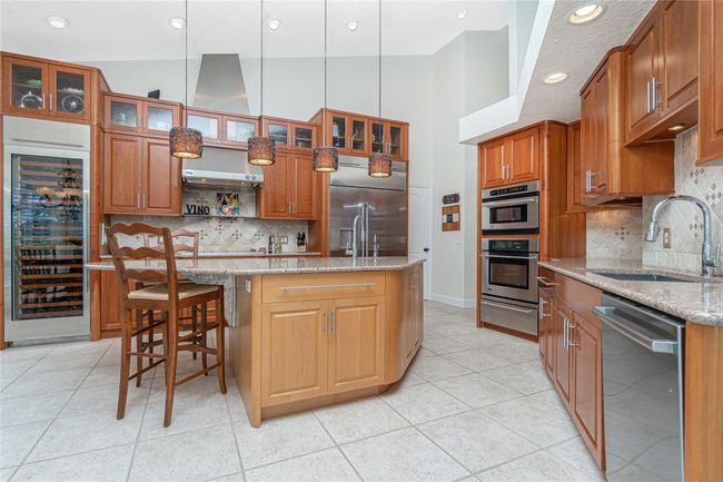 Gourmet chef's delight with full-size sub zero wine refrigerator | Image 11