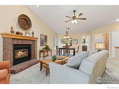 Living room and dining room with vaulted ceiling | Image 3