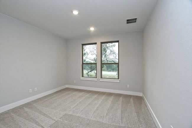 Unfurnished room featuring recessed lighting, light carpet, baseboards, and visible vents | Image 21