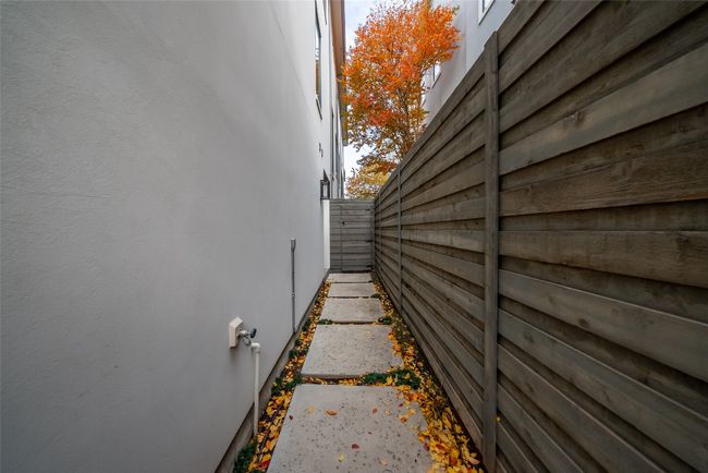 View of side of home with stucco siding | Image 6
