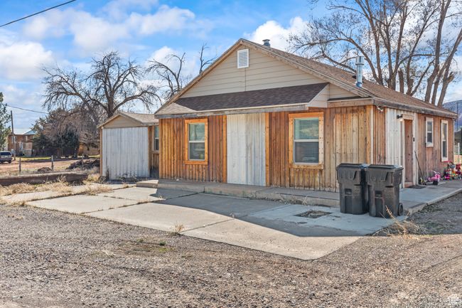 View of front of house with roof with shingles and an outbuilding | Image 28