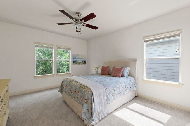 The primary bedroom is very large and has tons of room for storage. | Image 29