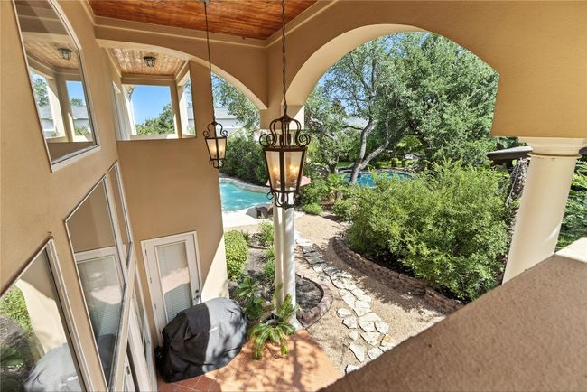 View of patio with an outdoor pool | Image 31
