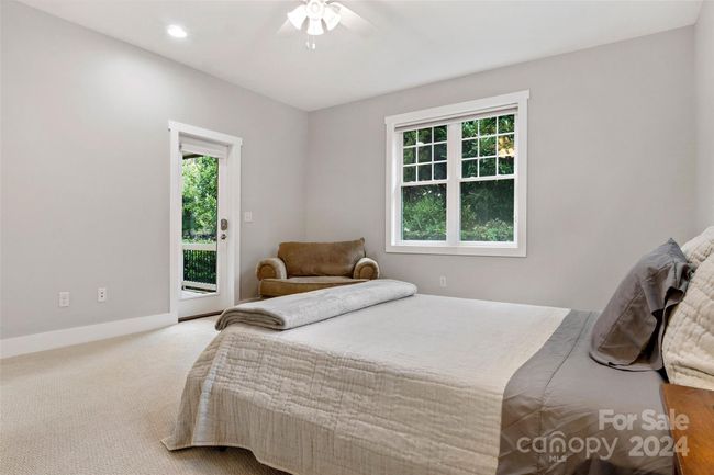 Primary Bedroom with exterior door to back patio | Image 21