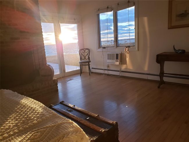 Primary 1st fl suite has beautiful sunset waterviews | Image 23
