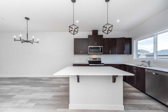 508 Legacy Circle Se, Home with 4 bedrooms, 3 bathrooms and 2 parking in Calgary AB | Image 4