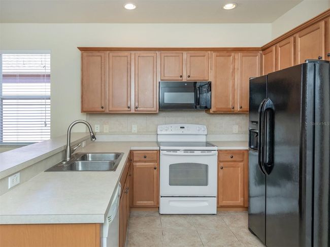 11649 Tempest Harbor Loop, House other with 3 bedrooms, 2 bathrooms and null parking in VENICE FL | Image 4