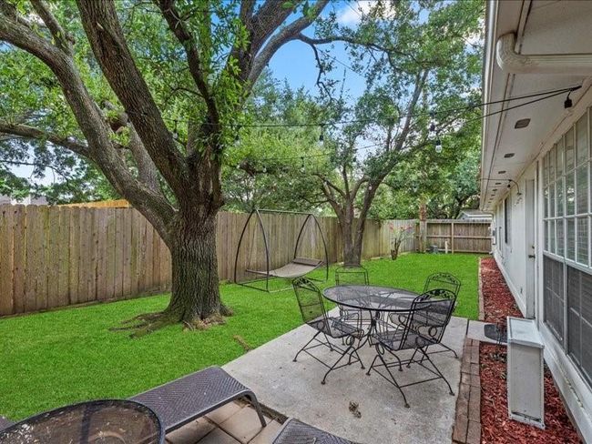 Outside, enjoy a private backyard with room to unwind, garden, or entertain under the stars. | Image 21