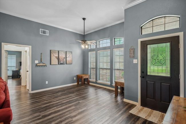 Dining area with large windows | Image 7