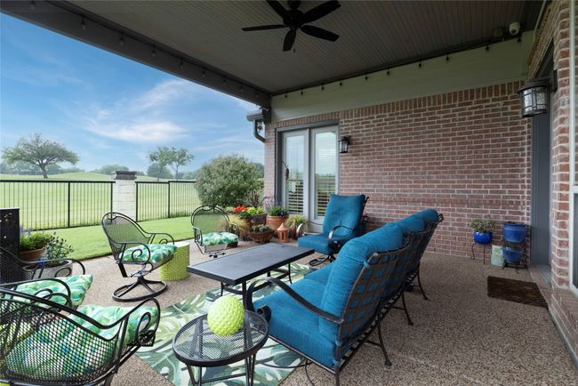 Large Covered Patio which is perfect for entertaining or simply a place to relax at the end of the day! | Image 32