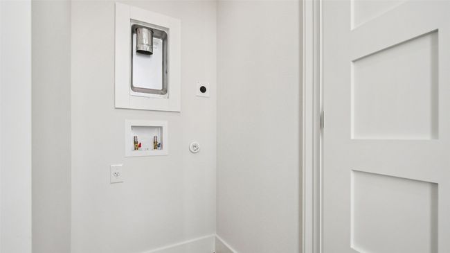 Laundry area featuring washer hookup and electric dryer hookup | Image 24