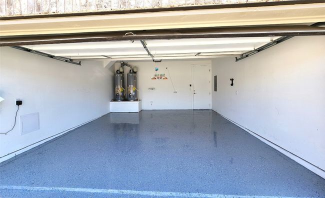 Garage featuring gas water heater | Image 27