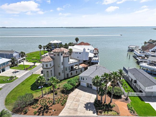 Stunning waterfront property with expansive views, ideal for serene living and coastal entertaining. | Image 31