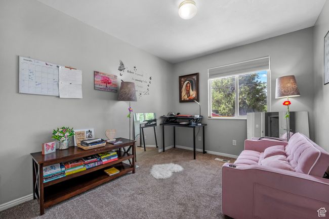 Carpeted office space with baseboards | Image 17
