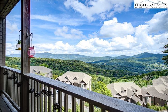 From its 1, 300 sq. ft. deck, fantastic views of the Village of Sugar Mountain, mountain range beyond and seasonal views of Sugar Mountain's ski slopes. | Image 5