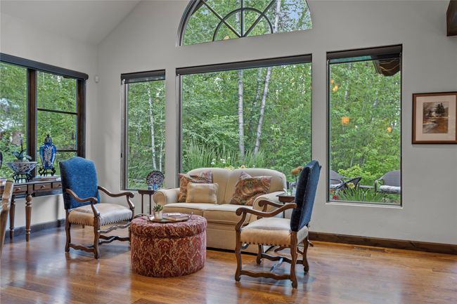 Sitting space off of the living and dining areas. | Image 23