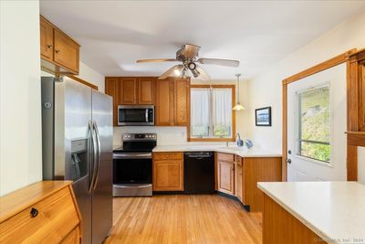 Kitchen with corian counters | Image 3