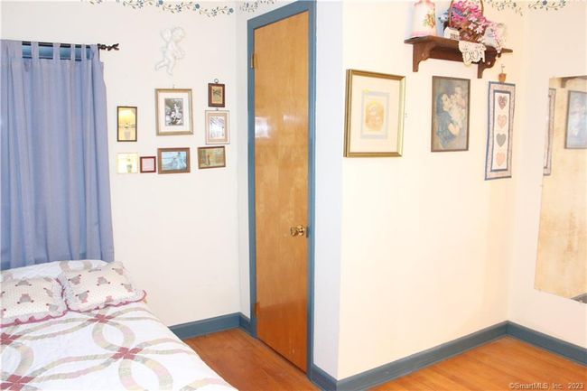 Bedroom #3 upper level. Hardwood floors. | Image 29
