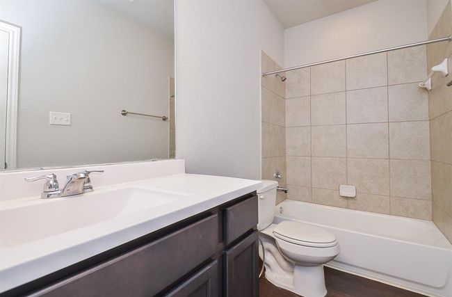 The convenience of combined shower/bathtub in a second bathroom, caters to personal options. | Image 24