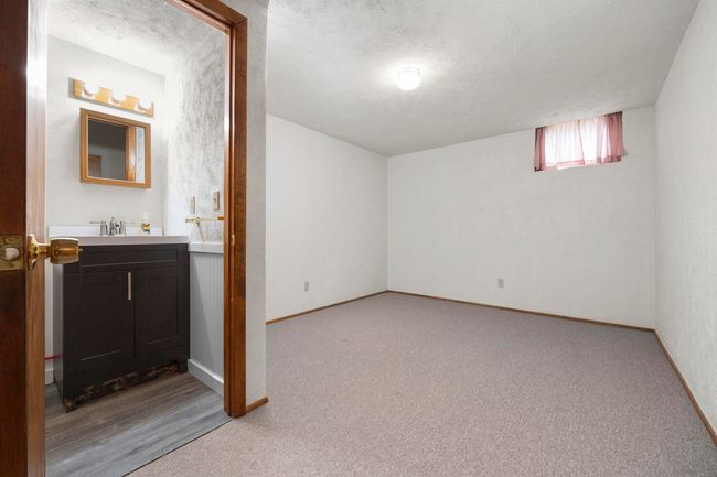 Non-conforming 4th BR w/ half bath in basement | Image 18