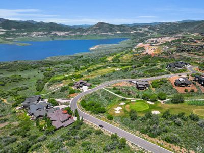 Drone / aerial view with a water and mountain view | Image 1