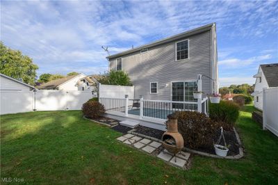 Back of house featuring a lawn | Image 2