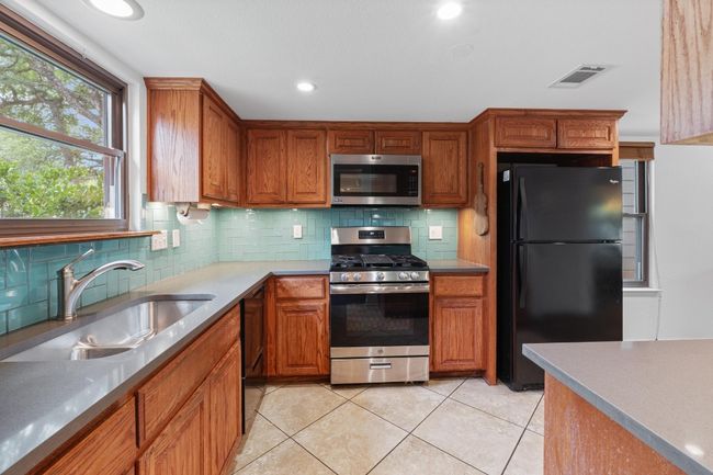 Whether you’re making coffee or hosting friends, the kitchen feels like a natural extension of the rest of the home | Image 11