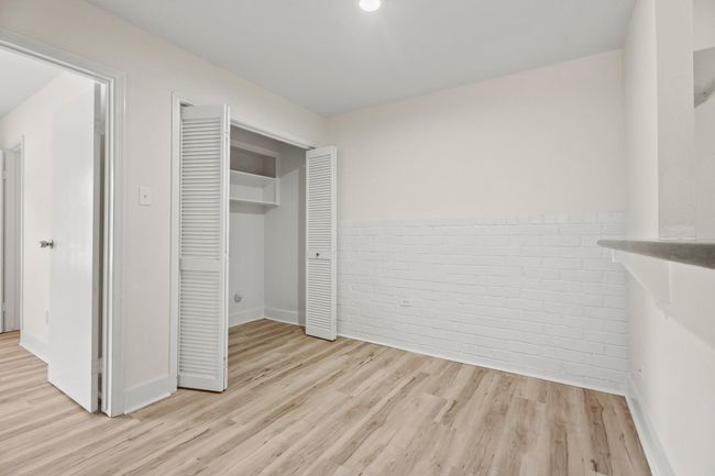 The breakfast room is open to the kitchen and living rooms. The double doors hide your own utility closet- ready for your washer and dryer. | Image 6