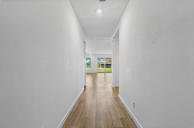 1846 Wandering Willow Way, House other with 3 bedrooms, 2 bathrooms and null parking in Loxahatchee FL | Image 9