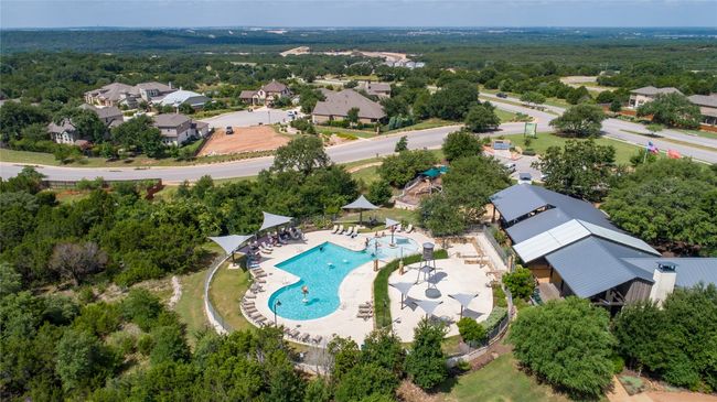 Aerial view of residential area featuring a pool area | Image 35