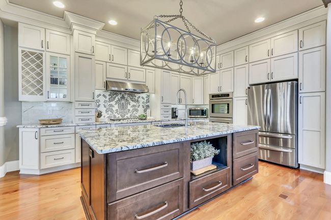 Floor to ceiling custom cabinetry in light, neutral tones. | Image 16